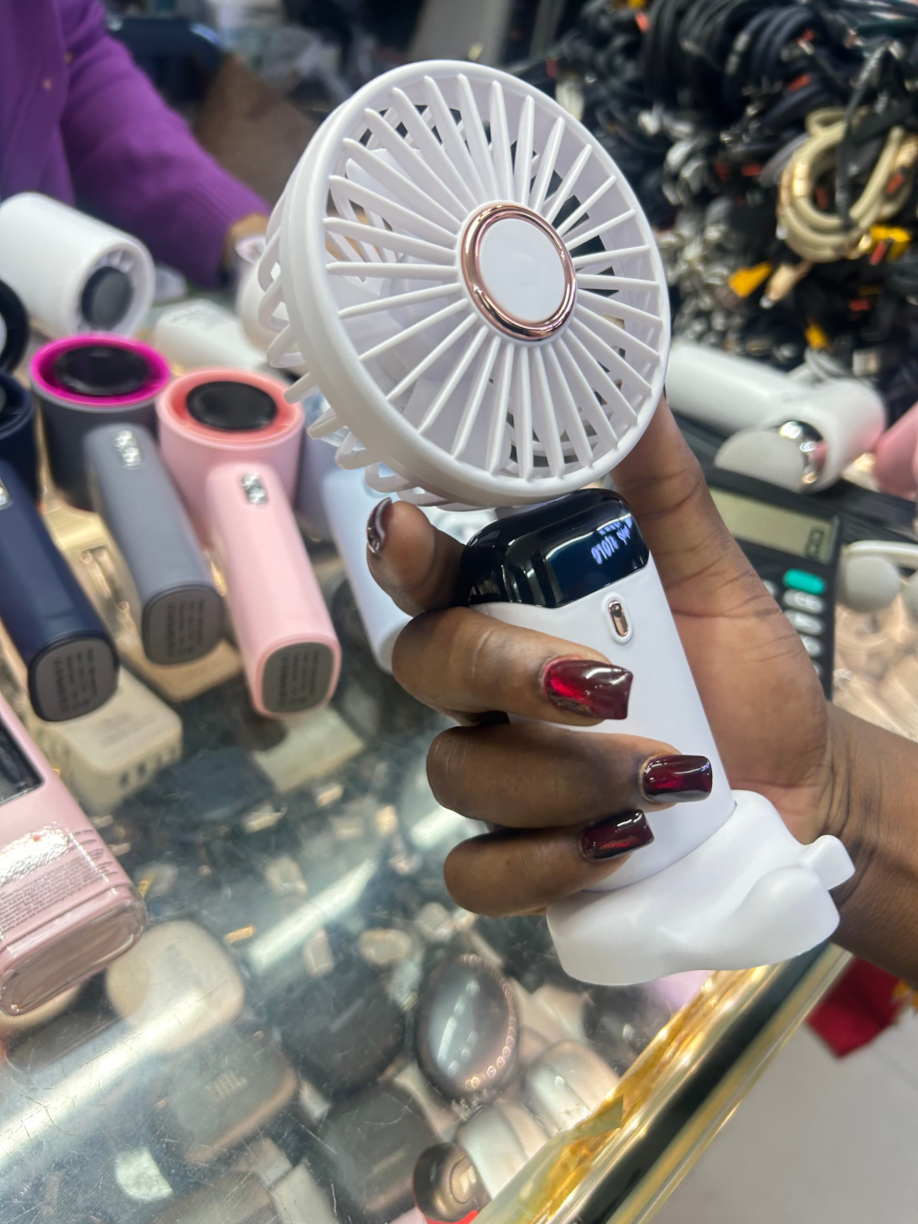 Portable hand fans